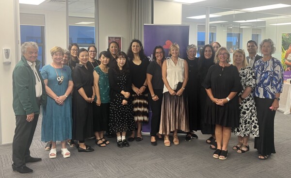 CE Fiona Kingsford (centre) next to General Manager Service Delivery Denise Shera (on her left), with kaumātua John Dobson (far left), Plunket kaimahi, members of Ngāi Tai ki Tāmaki and Asian Family Services, and representatives from the Botany Town Centre shopping mall. 